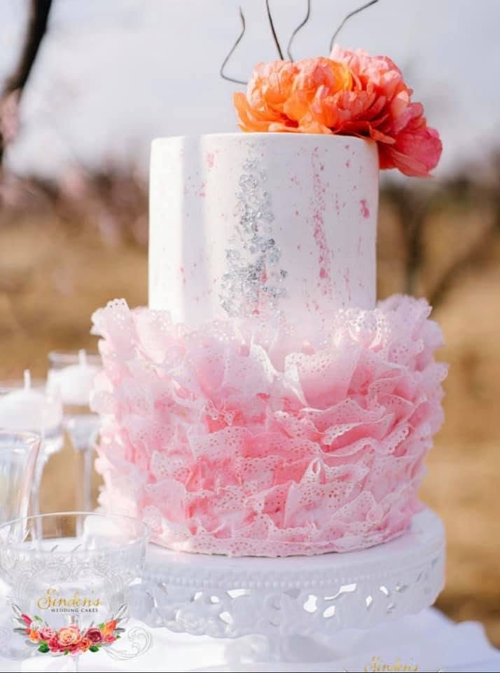 Tall blush ombre ruffle wedding cake