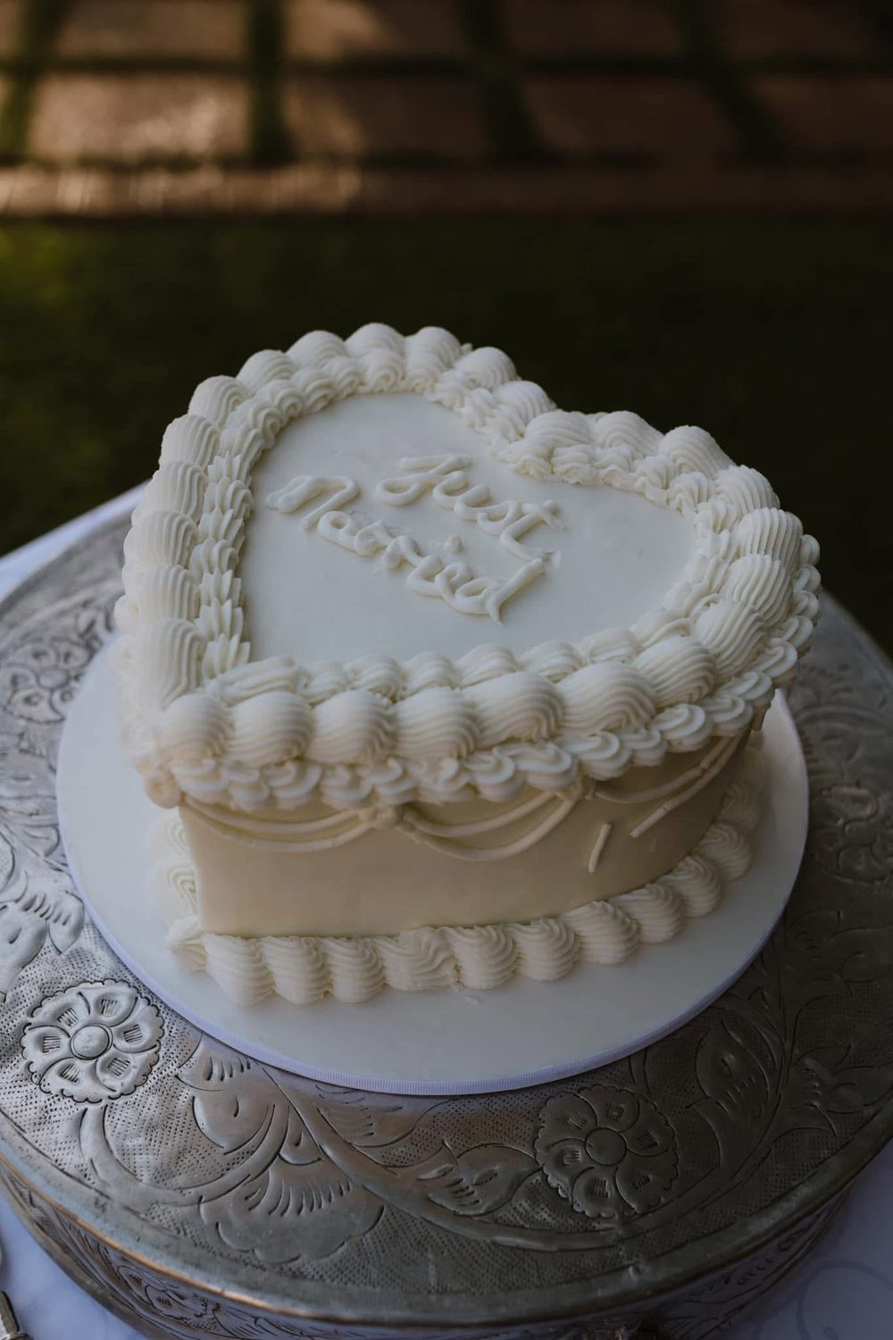 White textured heart-shaped cake
